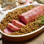 A hearty and aromatic bowl of Sausage and Lentils, showcasing the traditional Italian recipe filled with diverse vegetables and rich flavors.