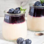 A serving of Homemade Panna Cotta, smooth and creamy, waiting to be adorned with a variety of toppings, showcasing its versatility as a favorite Italian dessert.
