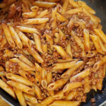 A hearty dish of Ragu alla Bolognese, representing traditional Bolognese cuisine.